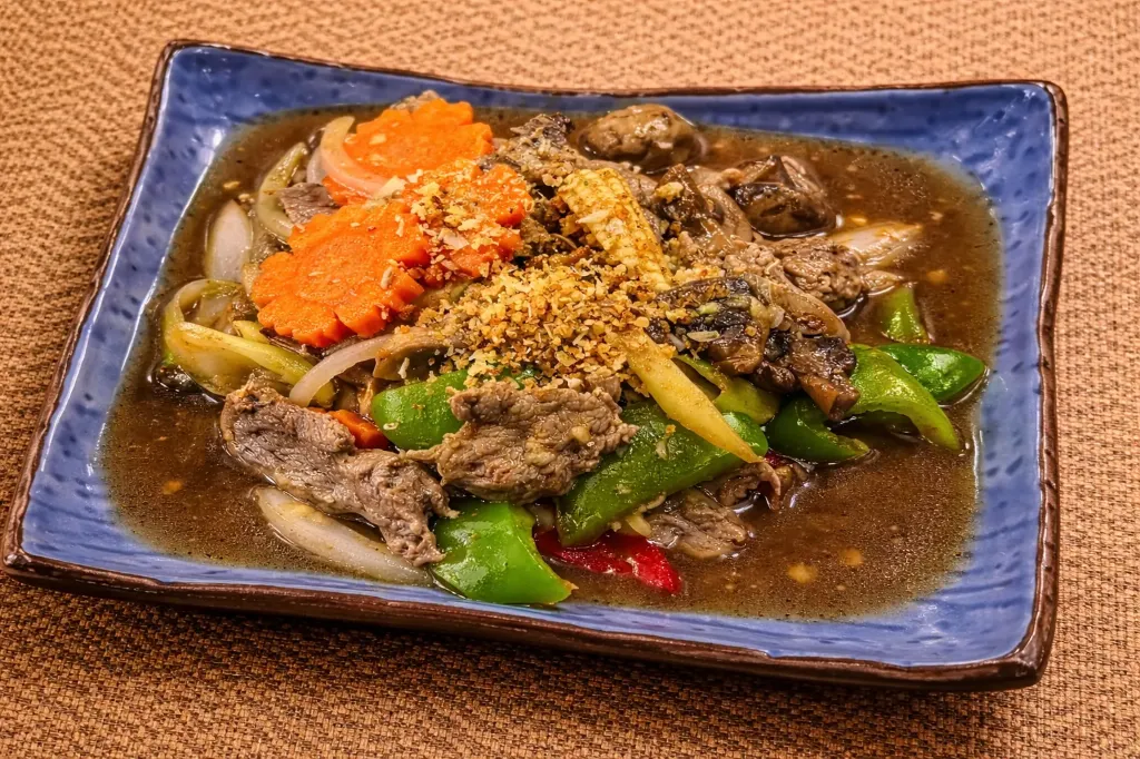 ستير فرايد ويذ أويستر صوص - เนื้อผัดน้ำมันหอย